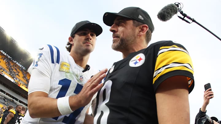 Nov 2, 2025; Pittsburgh, Pennsylvania, USA; Pittsburgh Steelers quarterback Aaron Rodgers (8) and Indianapolis Colts quarterback Daniel Jones (17) shake hands after the game at Acrisure Stadium. 