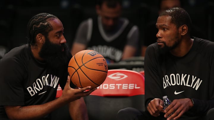 Oct 8, 2021; Brooklyn, New York, USA; Brooklyn Nets guard James Harden (13) and forward Kevin Durant (7) during warm ups before a preseason game against the Milwaukee Bucks at Barclays Center. Mandatory Credit: Brad Penner-Imagn Images
