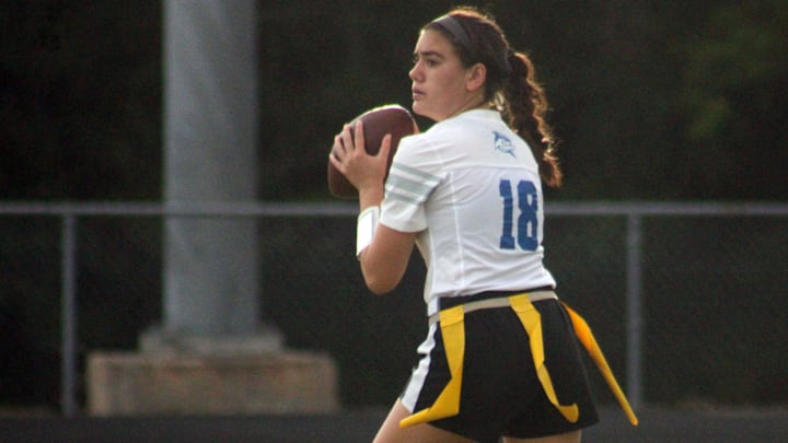 Spanish River quarterback Gianna Pacitti (18) looks downfield against Newsome during a Florida High School Athletic Association Class 2A flag football semifinal at Mandarin High School in Jacksonville on May 13, 2022. [Clayton Freeman/Florida Times-Union]