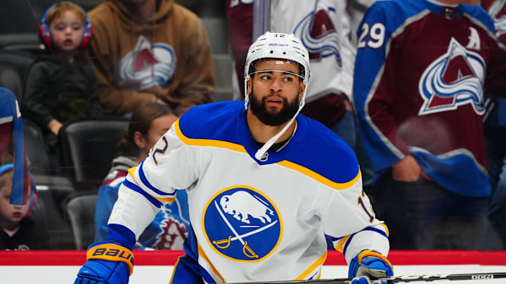 Nov 13, 2025; Denver, Colorado, USA; Buffalo Sabres left wing Jordan Greenway (12) before a game against the Colorado Avalanche at Ball Arena. Mandatory Credit: Ron Chenoy-Imagn Images Nov 13, 2025; Denver, Colorado, USA; Buffalo Sabres left wing Jordan Greenway (12) before a game against the Colorado Avalanche at Ball Arena. Mandatory Credit: Ron Chenoy-Imagn Images