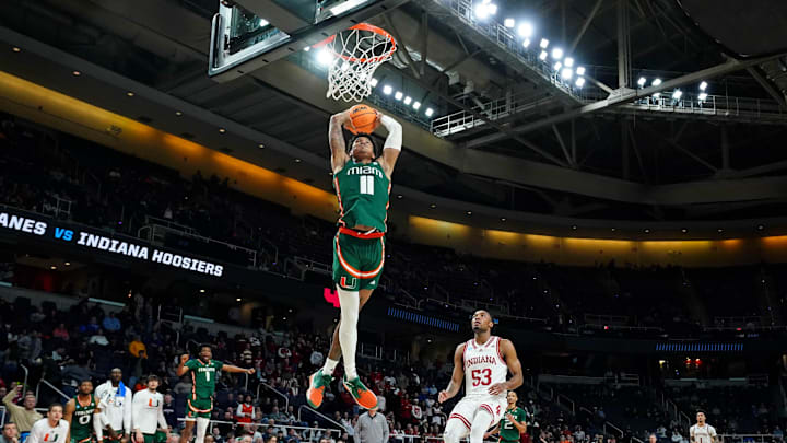 Mar 19, 2023; Albany, NY, USA; Miami (Fl) Hurricanes guard Jordan Miller (11) dunks against the Indiana Hoosiers during the second half at MVP Arena. Mandatory Credit: David Butler II-Imagn Images