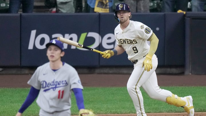 Milwaukee Brewers first baseman Jake Bauers (9) watched his double off Los Angeles Dodgers pitcher Roki Sasaki (11) during the ninth inning of their National League Championship Series game October 13, 2025 at American Family Field in Milwaukee, Wisconsin.