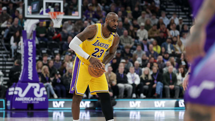Feb 12, 2025; Salt Lake City, Utah, USA; Los Angeles Lakers forward LeBron James (23) controls the ball during the first quarter against the Utah Jazz at Delta Center. Mandatory Credit: Chris Nicoll-Imagn Images