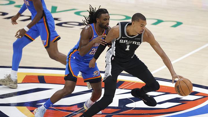 May 30, 2026; Oklahoma City, Oklahoma, USA; San Antonio Spurs forward Victor Wembanyama (1) controls the ball against Oklahoma City Thunder guard Cason Wallace (22) in the first quarter during game seven of the western conference finals for the 2026 NBA playoffs at Paycom Center. Mandatory Credit: Alonzo Adams-Imagn Images May 30, 2026; Oklahoma City, Oklahoma, USA; San Antonio Spurs forward Victor Wembanyama (1) controls the ball against Oklahoma City Thunder guard Cason Wallace (22) in the first quarter during game seven of the western conference finals for the 2026 NBA playoffs at Paycom Center. Mandatory Credit: Alonzo Adams-Imagn Images