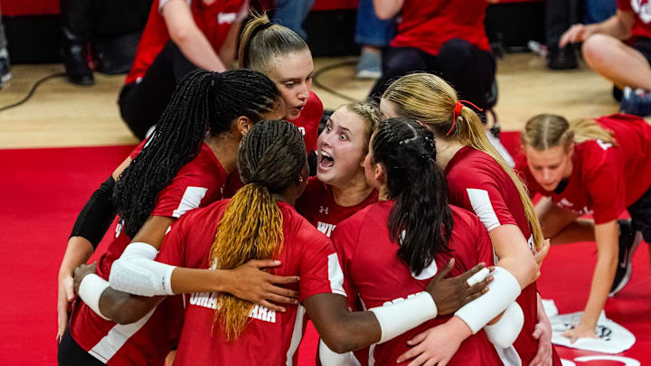 Oct 21, 2023; Lincoln, NE, USA; The Wisconsin Badgers celebrate after a point against the Nebraska Cornhuskers during the fourth set at the Bob Devaney Sports Center. Mandatory Credit: Dylan Widger-Imagn Images
