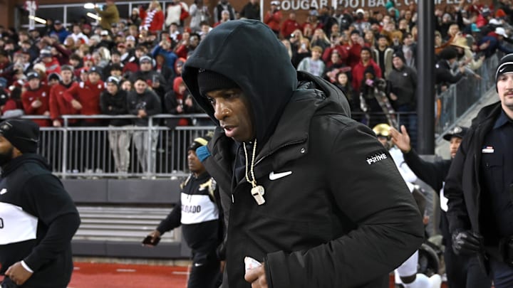 Nov 17, 2023; Pullman, Washington, USA; Colorado Buffaloes head coach Deion Sanders runs onto the