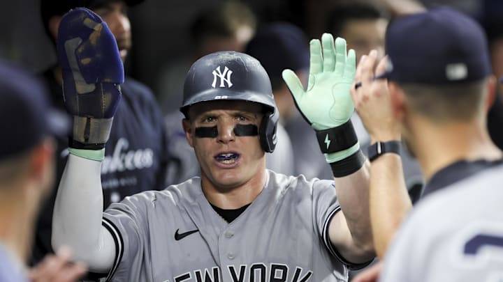 Aug 11, 2023; Miami, Florida, USA; New York Yankees center fielder Harrison Bader (22) celebrates with teammates after scoring against the Miami Marlins during the ninth inning at loanDepot Park. Mandatory Credit: Sam Navarro-Imagn Images Aug 11, 2023; Miami, Florida, USA; New York Yankees center fielder Harrison Bader (22) celebrates with teammates after scoring against the Miami Marlins during the ninth inning at loanDepot Park. Mandatory Credit: Sam Navarro-Imagn Images