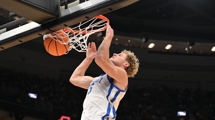 Mar 20, 2026; St. Louis, MO, USA; Kentucky Wildcats guard Collin Chandler (5) dunks the ball against the Santa Clara Broncos during the second half of a first round game of the men's 2026 NCAA Tournament at Enterprise Center. Mandatory Credit: Jeff Curry-Imagn Images
