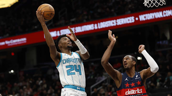 Dec 26, 2024; Washington, District of Columbia, USA; Charlotte Hornets forward Brandon Miller (24) shoots the ball as Washington Wizards forward Alexandre Sarr (20) defends in the second quarter at Capital One Arena. Mandatory Credit: Geoff Burke-Imagn Images Dec 26, 2024; Washington, District of Columbia, USA; Charlotte Hornets forward Brandon Miller (24) shoots the ball as Washington Wizards forward Alexandre Sarr (20) defends in the second quarter at Capital One Arena. Mandatory Credit: Geoff Burke-Imagn Images
