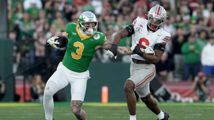 Jan 1, 2025; Pasadena, CA, USA; Oregon Ducks tight end Terrance Ferguson (3) runs against Ohio State Buckeyes safety Sonny Styles (6) in the third quarter in the 2025 Rose Bowl college football quarterfinal game at Rose Bowl Stadium. Mandatory Credit: Kirby Lee-Imagn Images