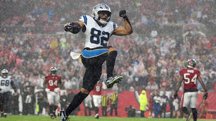 Jan 3, 2026; Tampa, Florida, USA; Carolina Panthers tight end Tommy Tremble (82) scores a touchdown against the Tampa Bay Buccaneers in the first half at Raymond James Stadium. Mandatory Credit: Nathan Ray Seebeck-Imagn Images