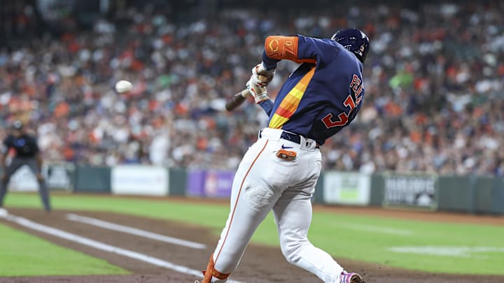 Sep 22, 2024; Houston, Texas, USA; Houston Astros shortstop Jeremy Pena (3) hits a double during the second inning against the Los Angeles Angels at Minute Maid Park. Mandatory Credit: Troy Taormina-Imagn Images