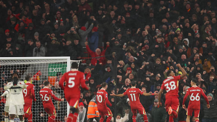 Liverpool players celebrate Mo Salah's goal against Manchester United
