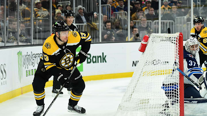 Jan 30, 2025; Boston, Massachusetts, USA; Boston Bruins center Charlie Coyle (13) looks to make a pass during the third period against the Winnipeg Jets at TD Garden. Mandatory Credit: Bob DeChiara-Imagn Images