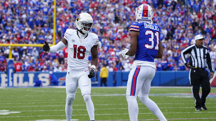 Sep 8, 2024; Orchard Park, New York, USA; Arizona Cardinals wide receiver Marvin Harrison Jr. (18) lines up against Buffalo Bills cornerback Rasul Douglas (31) during the second half at Highmark Stadium.