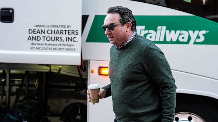 Michigan State head coach Jonathan Smith walks off the bus before the Michigan game at Michigan Stadium in Ann Arbor on Saturday, Oct. 26, 2024.