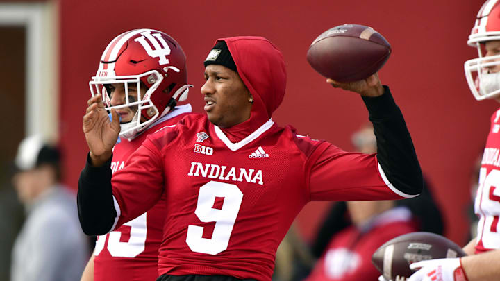 Nov 20, 2021; Bloomington, Indiana, USA;  Indiana Hoosiers quarterback Michael Penix Jr. (9) is seen out with the team during warms up before the game against the Minnesota Golden Gophers at Memorial Stadium. Mandatory Credit: Marc Lebryk-Imagn Images