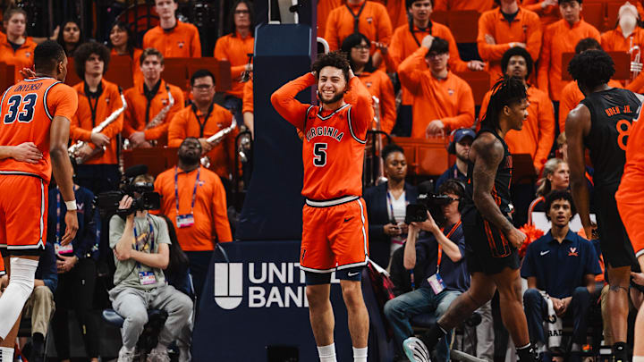 Feb 21, 2026; Charlottesville, Virginia, USA; Virginia Cavaliers guard Sam Lewis (5) reacts in the second half against the Miami (FL) Hurricanes at John Paul Jones Arena. Mandatory Credit: Emily Faith Morgan-Imagn Images