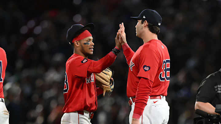 Sep 6, 2024; Boston, Massachusetts, USA; Boston Red Sox first baseman Triston Casas (36) high-fives shortstop Ceddanne Rafaela (43) after a game against the Chicago White Sox at Fenway Park. Mandatory Credit: Brian Fluharty-Imagn Images