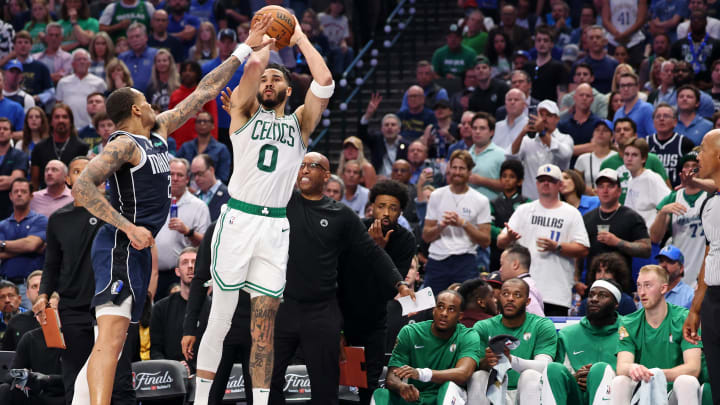 Jun 12, 2024; Dallas, Texas, USA; Boston Celtics forward Jayson Tatum (0) shoots the ball against Dallas Mavericks center Dereck Lively II (2) during the second quarter during game three of the 2024 NBA Finals at American Airlines Center. Mandatory Credit: Kevin Jairaj-USA TODAY Sports Jun 12, 2024; Dallas, Texas, USA; Boston Celtics forward Jayson Tatum (0) shoots the ball against Dallas Mavericks center Dereck Lively II (2) during the second quarter during game three of the 2024 NBA Finals at American Airlines Center. Mandatory Credit: Kevin Jairaj-USA TODAY Sports