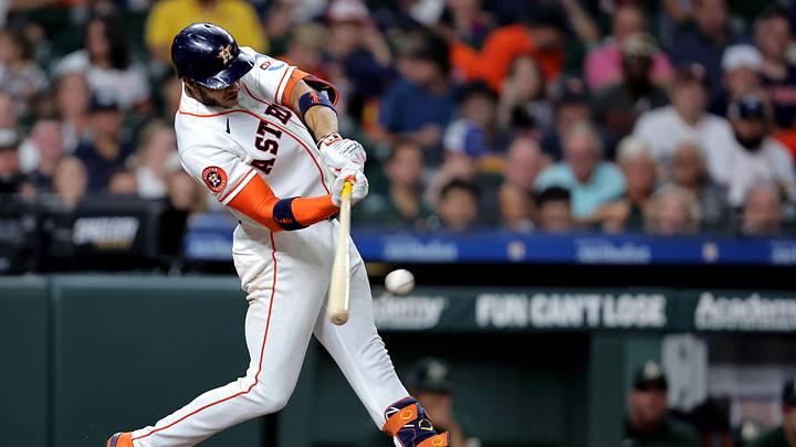 Aug 22, 2026; Houston, Texas, USA;  Houston Astros shortstop Jeremy Pena (3) hits an RBI single against the Athletics during the seventh inning at Daikin Park.  Mandatory Credit: Erik Williams-Imagn Images