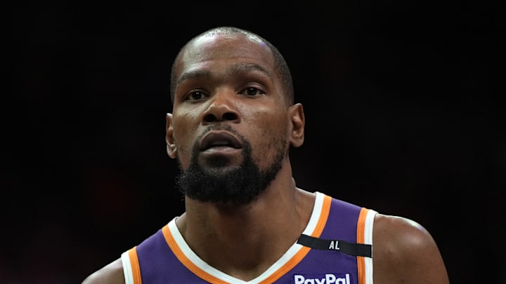 Mar 26, 2025; Phoenix, Arizona, USA; Phoenix Suns forward Kevin Durant (35) looks on against the Boston Celtics during the second half at Footprint Center. Mandatory Credit: Rick Scuteri-Imagn Images
