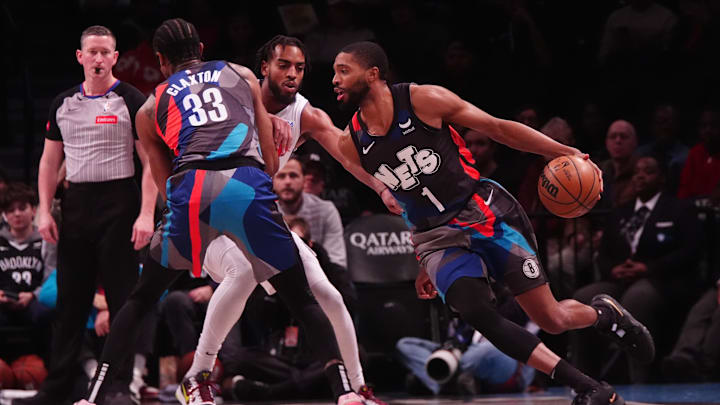 Apr 6, 2024; Brooklyn, New York, USA; Brooklyn Nets small forward Mikal Bridges (1) dribbles the ball against the Detroit Pistons during the first half at Barclays Center. Mandatory Credit: Gregory Fisher-USA TODAY Sports