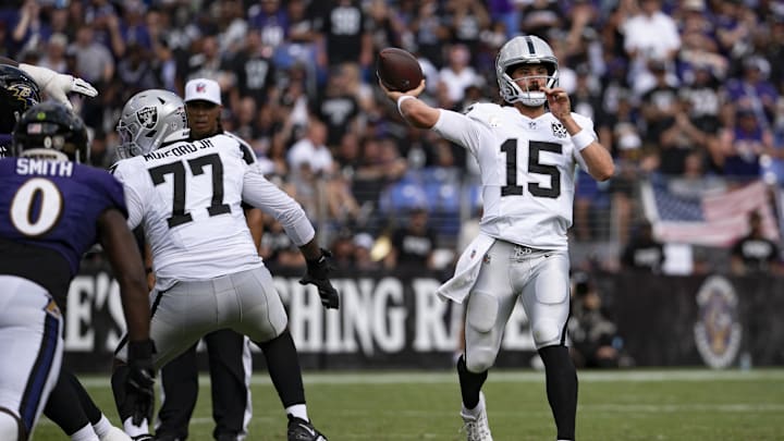 Sep 15, 2024; Baltimore, Maryland, USA;  Las Vegas Raiders quarterback Gardner Minshew (15) throws to the endzone during the second half against the Baltimore Ravens at M&T Bank Stadium. Mandatory Credit: Tommy Gilligan-Imagn Images