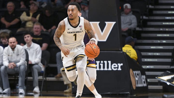 Nov 3, 2025; Nashville, Tennessee, USA;  Vanderbilt Commodores guard Frankie Collins (1) brings the ball up court against the Lipscomb Bisons during the second half at Memorial Gymnasium. Mandatory Credit: Steve Roberts-Imagn Images