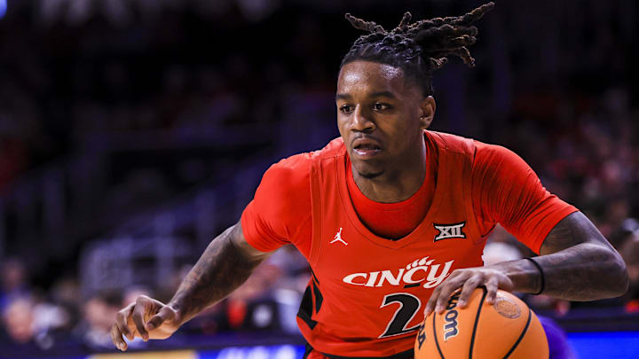 Mar 5, 2025; Cincinnati, Ohio, USA; Cincinnati Bearcats guard Jizzle James (2) dribbles against the Kansas State Wildcats in the first half at Fifth Third Arena. Mandatory Credit: Katie Stratman-Imagn Images