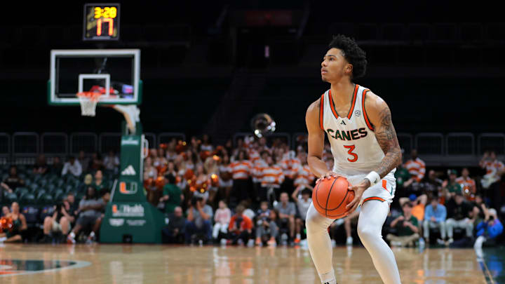 Dec 7, 2024; Coral Gables, Florida, USA; Miami Hurricanes guard Jalil Bethea (3) shoots the basketball against the Clemson Tigers during the second half at Watsco Center. Mandatory Credit: Sam Navarro-Imagn Images