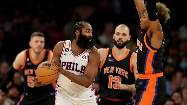 Feb 5, 2023; New York, New York, USA; Philadelphia 76ers guard James Harden (1) controls the ball against New York Knicks center Isaiah Hartenstein (55) and guards Evan Fournier (13) and Miles McBride (2) during the fourth quarter at Madison Square Garden. Mandatory Credit: Brad Penner-Imagn Images