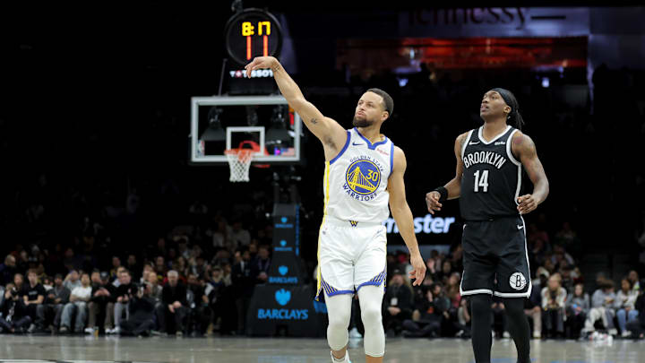 Dec 29, 2025; Brooklyn, New York, USA; Golden State Warriors guard Stephen Curry (30) watches his three point shot against Brooklyn Nets guard Terance Mann (14) during the first quarter at Barclays Center. Mandatory Credit: Brad Penner-Imagn Images Dec 29, 2025; Brooklyn, New York, USA; Golden State Warriors guard Stephen Curry (30) watches his three point shot against Brooklyn Nets guard Terance Mann (14) during the first quarter at Barclays Center. Mandatory Credit: Brad Penner-Imagn Images