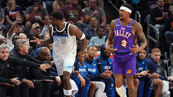 Mar 2, 2025; Phoenix, Arizona, USA; Minnesota Timberwolves guard Anthony Edwards (5) reacts after making a basket against Phoenix Suns guard Bradley Beal (3) during the second half at Footprint Center. Mandatory Credit: Joe Camporeale-Imagn Images