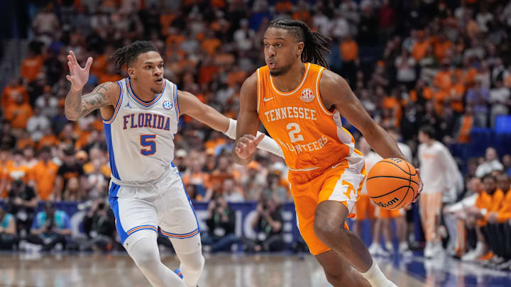 Tennessee guard Chaz Lanier (2) drives up court past Florida guard Will Richard (5) during the first half of the Southeastern Conference tournament championship at Bridgestone Arena in Nashville, Tenn., Sunday, March 16, 2025.