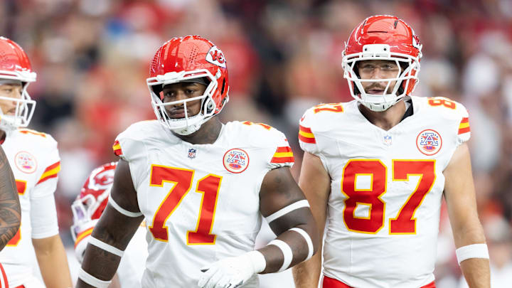 Aug 9, 2025; Glendale, Arizona, USA; Kansas City Chiefs offensive tackle Josh Simmons (71) and tight end Travis Kelce (87) against the Arizona Cardinals during a preseason NFL game at State Farm Stadium. Mandatory Credit: Mark J. Rebilas-Imagn Images