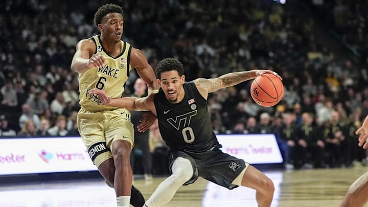 Jan 3, 2026; Winston-Salem, N.C.; Virginia Tech Hokies guard Jailen Bedford (0) handles the ball defended by Wake Forest Demon Deacons guard Myles Colvin (6).