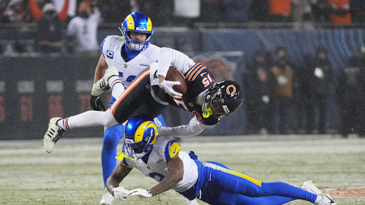 Jan 18, 2026; Chicago, IL, USA; Los Angeles Rams safety Kam Curl (3) tackles and upends Chicago Bears wide receiver Rome Odunze (15) during the second quarter of an NFC Divisional Round game at Soldier Field. Mandatory Credit: David Banks-Imagn Images