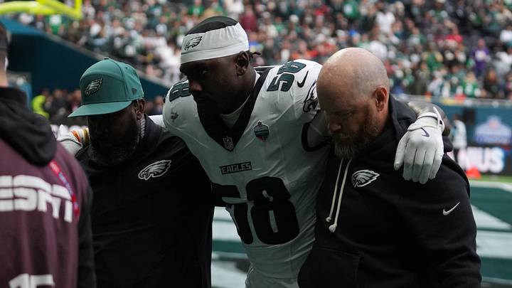 Oct 11, 2026; Tottenham, ENG;  Philadelphia Eagles linebacker Jalyx Hunt (58) is helped off the field after an injury during the game against the Jacksonville Jaguars at Tottenham Hotspur Stadium.  Mandatory Credit: Kirby Lee-Imagn Images
