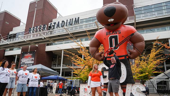 Oregon State fans take pictures with Benny Beaver and the turnover chainsaw before the the NCAA football game against Texas Tech at Reser Stadium on Saturday, Sept. 12, 2026, in Corvallis, Oregon Oregon State fans take pictures with Benny Beaver and the turnover chainsaw before the the NCAA football game against Texas Tech at Reser Stadium on Saturday, Sept. 12, 2026, in Corvallis, Oregon