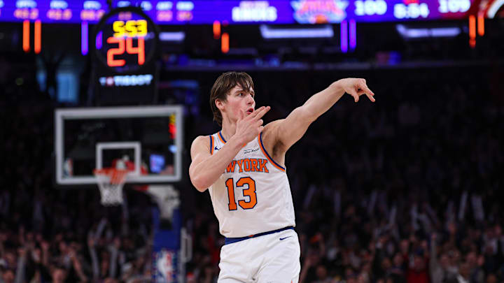 Dec 25, 2025; New York, New York, USA; New York Knicks guard Tyler Kolek (13) reacts after making a three point basket during the second half against the Cleveland Cavaliers at Madison Square Garden. Mandatory Credit: Vincent Carchietta-Imagn Images