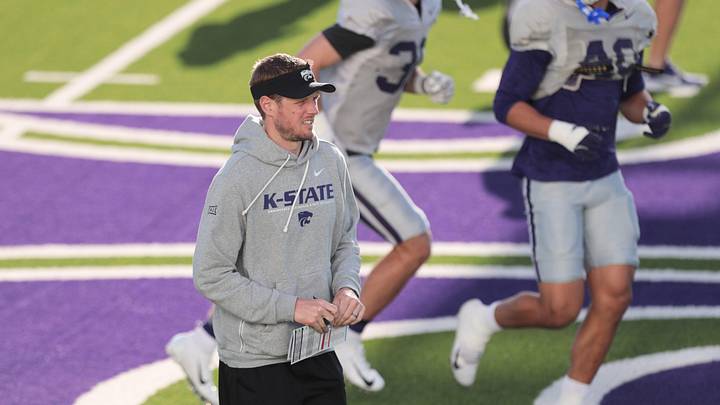 Kansas State head coach Collin Klein walks the field during practice on Tuesday, April 21, 2026.