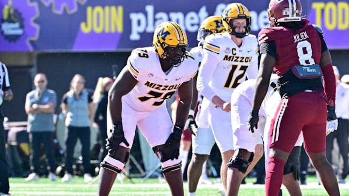 Oct 12, 2024; Amherst, Massachusetts, USA; Missouri Tigers offensive lineman Armand Membou (79) lines up against the Massachusetts Minutemen during the first half at Warren McGuirk Alumni Stadium. Mandatory Credit: Eric Canha-Imagn Images