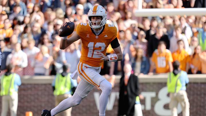 Oct 17, 2026; Knoxville, Tennessee, USA; Tennessee Volunteers quarterback George MacIntyre (12) runs against the Alabama Crimson Tide during the first half at Neyland Stadium. Mandatory Credit: Randy Sartin-Imagn Images Oct 17, 2026; Knoxville, Tennessee, USA; Tennessee Volunteers quarterback George MacIntyre (12) runs against the Alabama Crimson Tide during the first half at Neyland Stadium. Mandatory Credit: Randy Sartin-Imagn Images