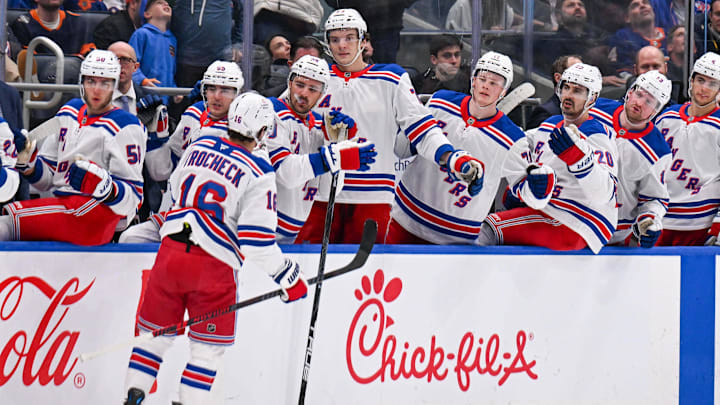 Apr 10, 2025; Elmont, New York, USA;  New York Rangers center Vincent Trocheck (16) celebrate his goal against the New York Islanders during the first period at UBS Arena. Mandatory Credit: Dennis Schneidler-Imagn Images