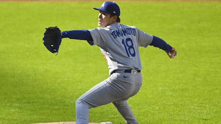 Los Angeles Dodgers starting pitcher Yoshinobu Yamamoto (18) delivers a pitch in the first inning against the Cleveland Guardians at Progressive Field on May 26.