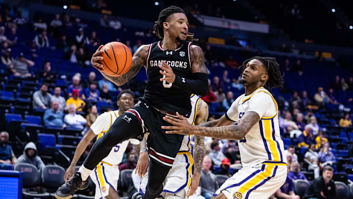 Feb 18, 2025; Baton Rouge, Louisiana, USA; South Carolina Gamecocks guard Jamarii Thomas (6) drives to the basket against LSU Tigers forward Daimion Collins (10) during the second half at Pete Maravich Assembly Center. Mandatory Credit: Stephen Lew-Imagn Images Feb 18, 2025; Baton Rouge, Louisiana, USA; South Carolina Gamecocks guard Jamarii Thomas (6) drives to the basket against LSU Tigers forward Daimion Collins (10) during the second half at Pete Maravich Assembly Center. Mandatory Credit: Stephen Lew-Imagn Images