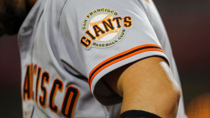 Jul 18, 2023; Cincinnati, Ohio, USA; The San Francisco Giants logo on the sleeve of right fielder Michael Conforto (8) during the fifth inning against the Cincinnati Reds at Great American Ball Park. Jul 18, 2023; Cincinnati, Ohio, USA; The San Francisco Giants logo on the sleeve of right fielder Michael Conforto (8) during the fifth inning against the Cincinnati Reds at Great American Ball Park.