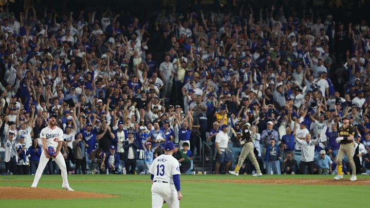 Oct 11, 2024; Los Angeles, California, USA; Los Angeles Dodgers pitcher Michael Kopech (45) reacts in the eighth inning against the San Diego Padres during game five of the NLDS for the 2024 MLB Playoffs at Dodger Stadium. Mandatory Credit: Kiyoshi Mio-Imagn Images Oct 11, 2024; Los Angeles, California, USA; Los Angeles Dodgers pitcher Michael Kopech (45) reacts in the eighth inning against the San Diego Padres during game five of the NLDS for the 2024 MLB Playoffs at Dodger Stadium. Mandatory Credit: Kiyoshi Mio-Imagn Images