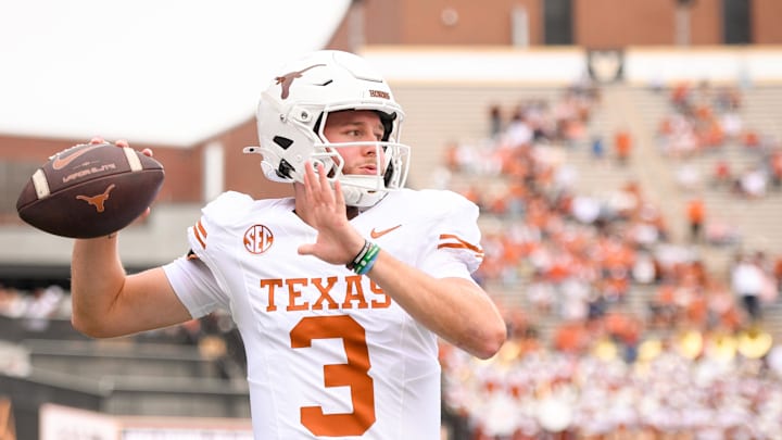 Oct 26, 2024; Nashville, Tennessee, USA;  Texas Longhorns quarterback Quinn Ewers (3) throws against the Vanderbilt Commodores during pregame warmups at FirstBank Stadium. Mandatory Credit: Steve Roberts-Imagn Images